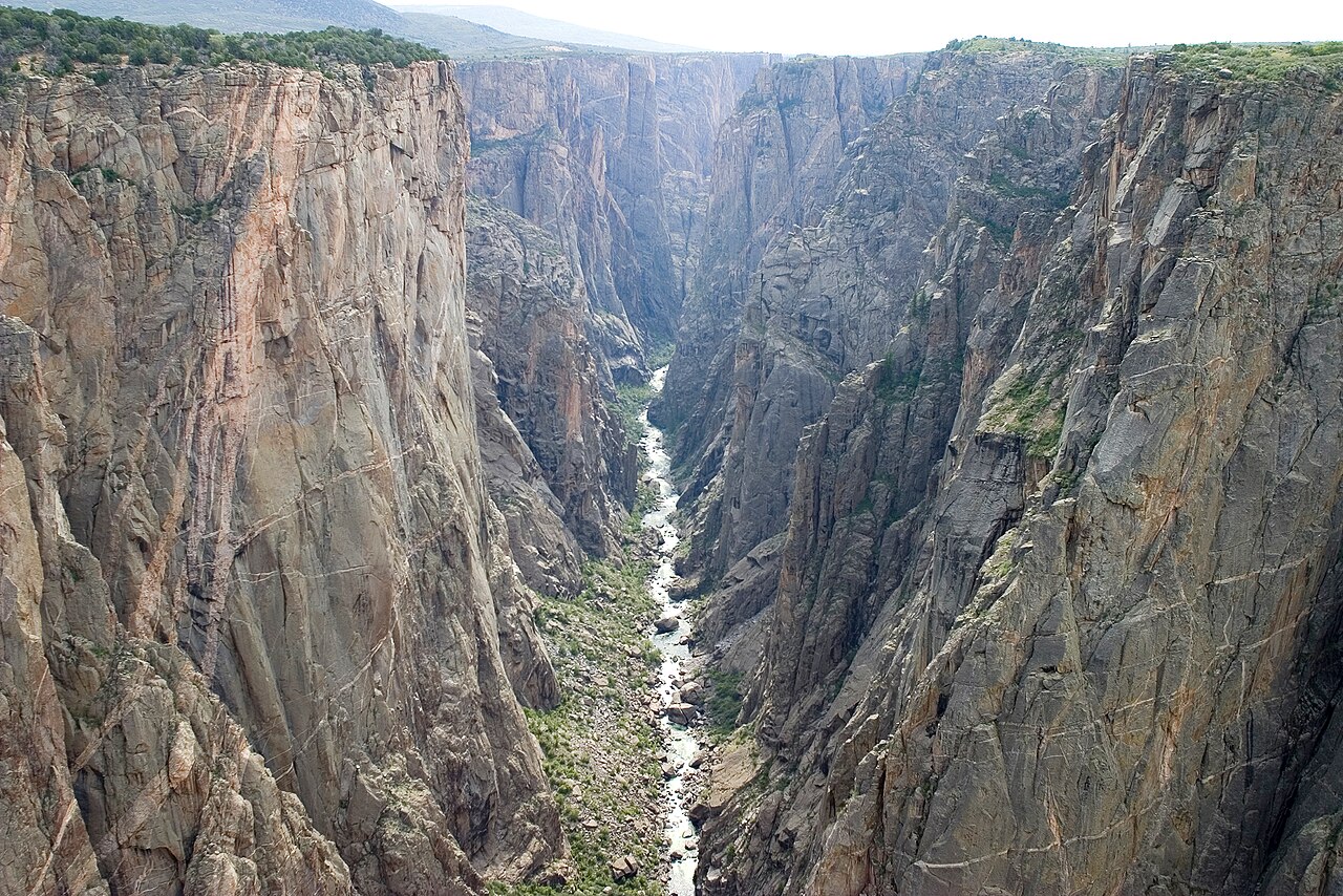 Chasm View at Black Canyon of the Gunnison, sheer rock walls dropping to a river far below